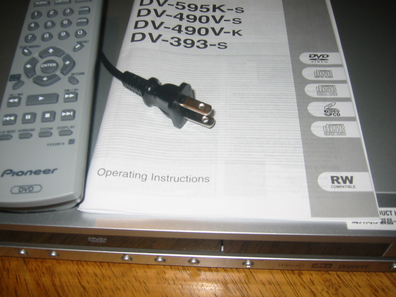 Picture of a "region-free" Pioneer DV-393-s DVD player, which is able to play DVDs having any region code and is
compatible with typical North American video equipment. This one even has a North American plug.