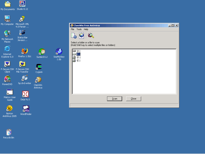 Screen shot showing ClamWin application window on a Windows 2000 desktop showing the A:, C:, D: and E: drives represented by icons.